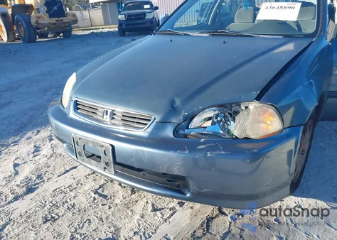 1998 Honda Civic Lx z USA, uszkodzony, nr VIN 1HGEJ6572WL035207